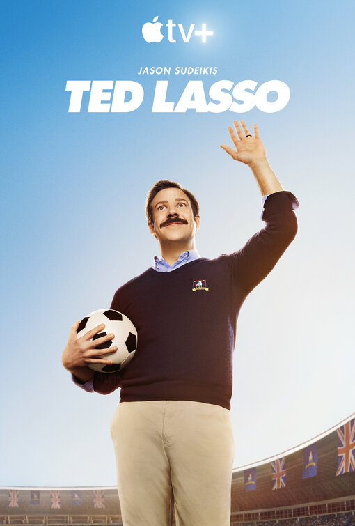 ted lasso tv poster showing man holding football waving
