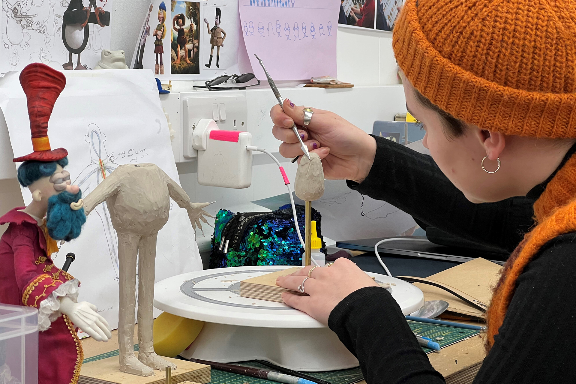 Student creating a puppet