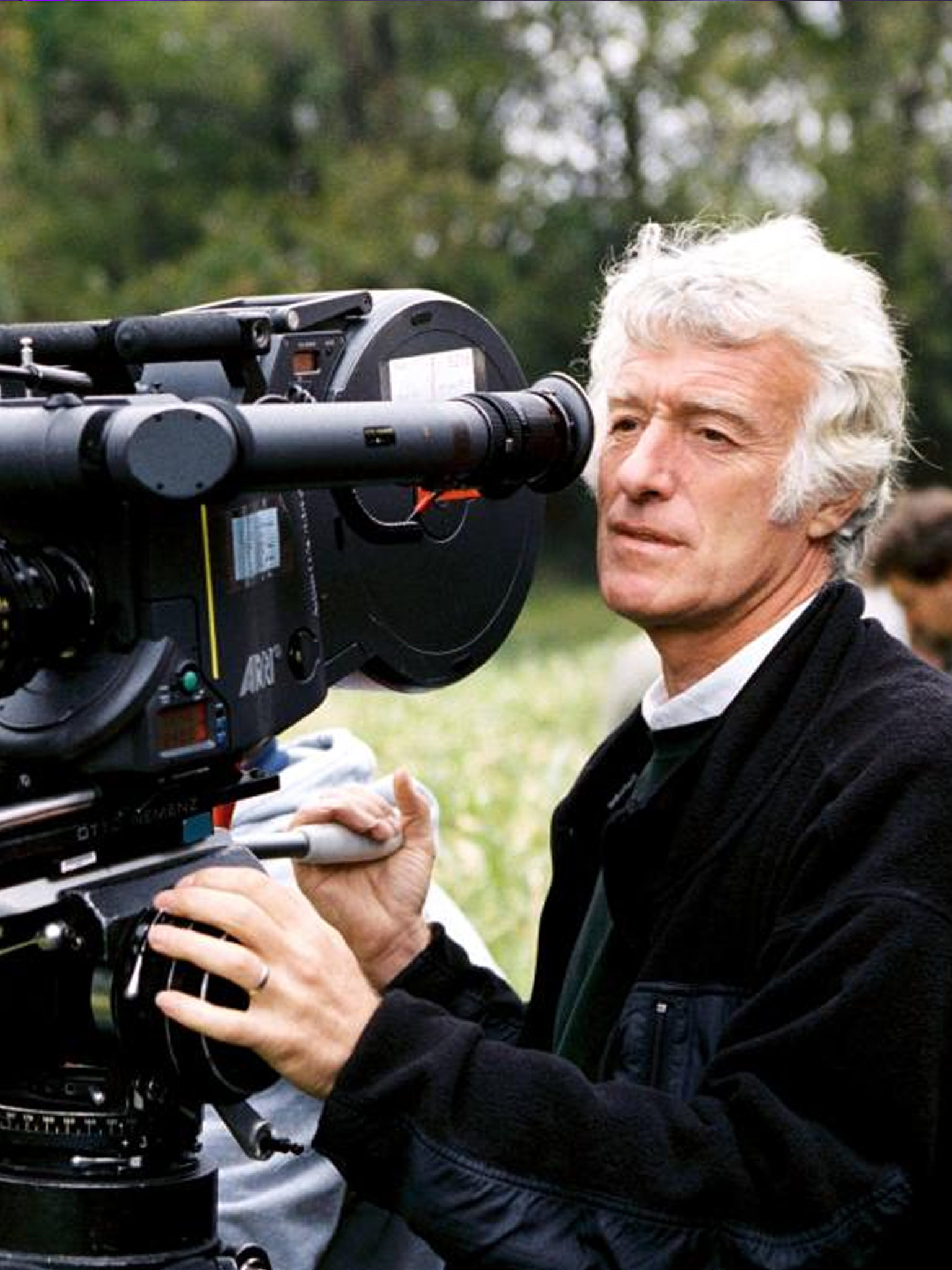 Roger Deakins with camera on location