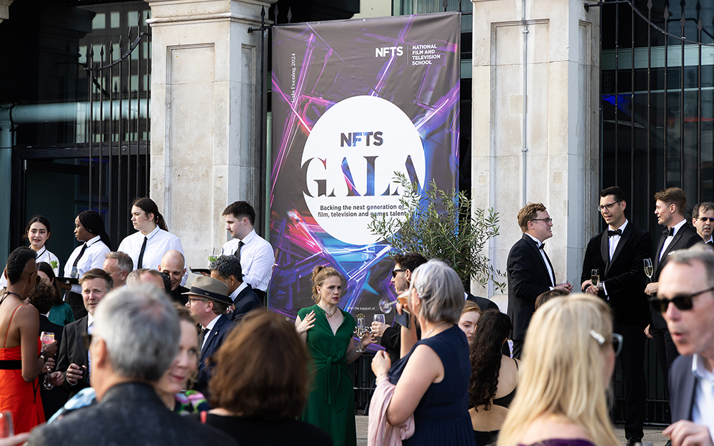 People enjoying gala reception by river thames