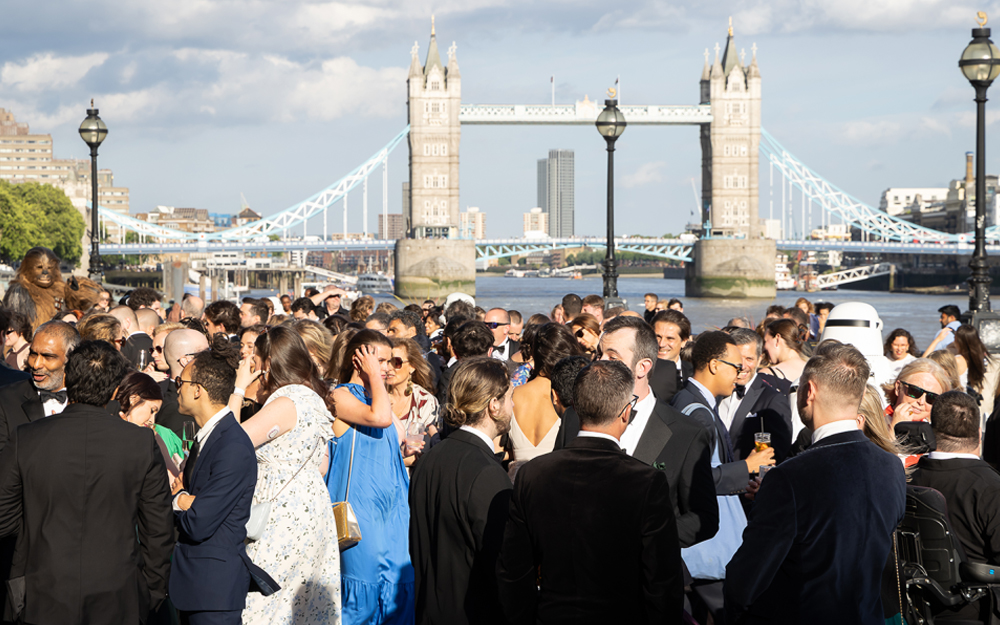 Guests enjoying reception by the River Thames