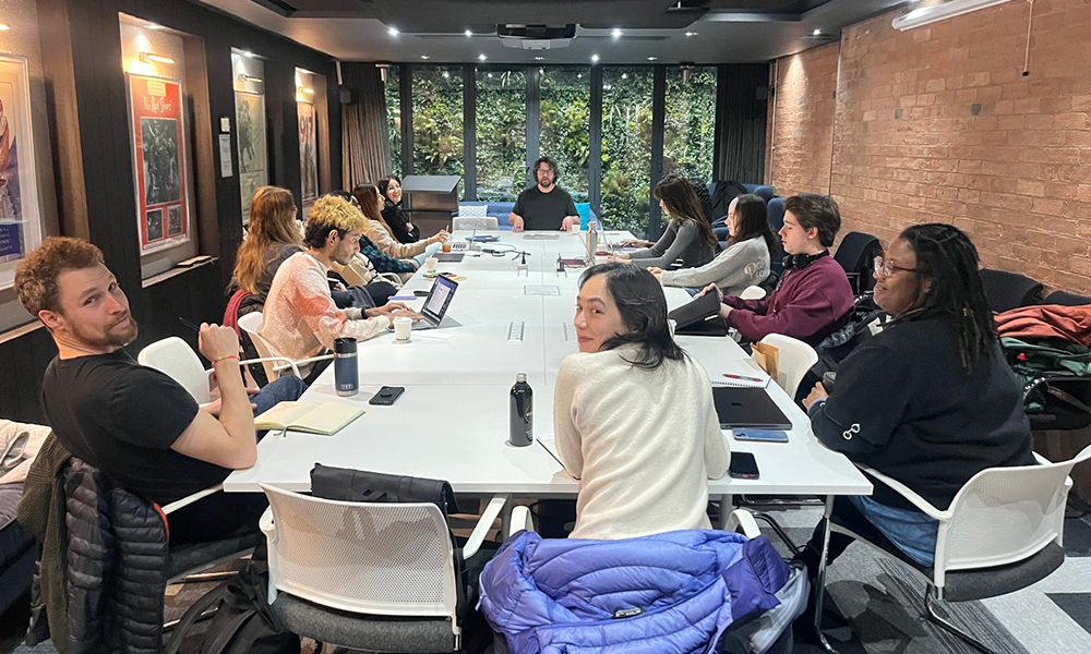 Students sitting round seminar table