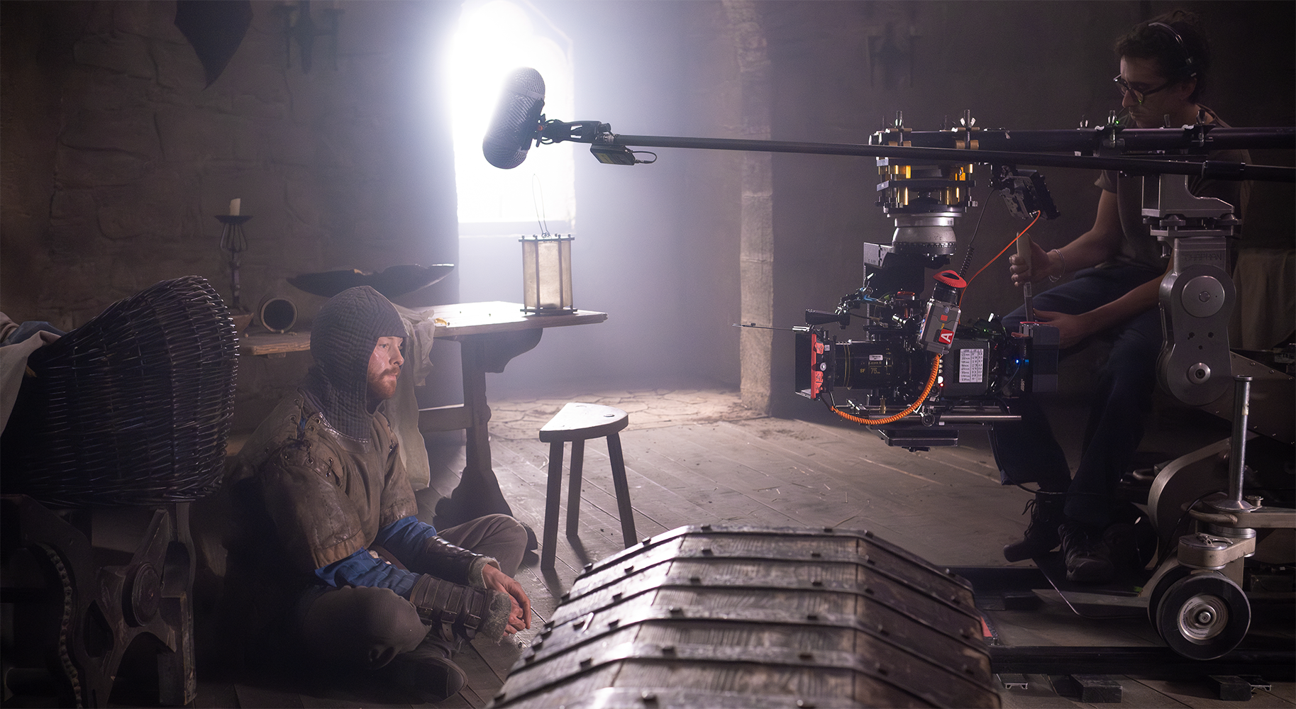 film set with man dressed as a knight in a tower