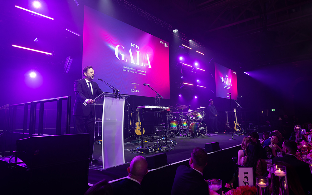 Gala Chair Lee Jury talking on stage