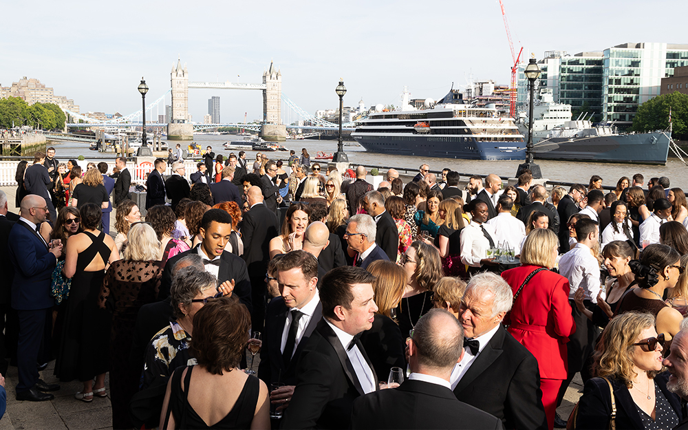 Gala guests by the River Thames at reception