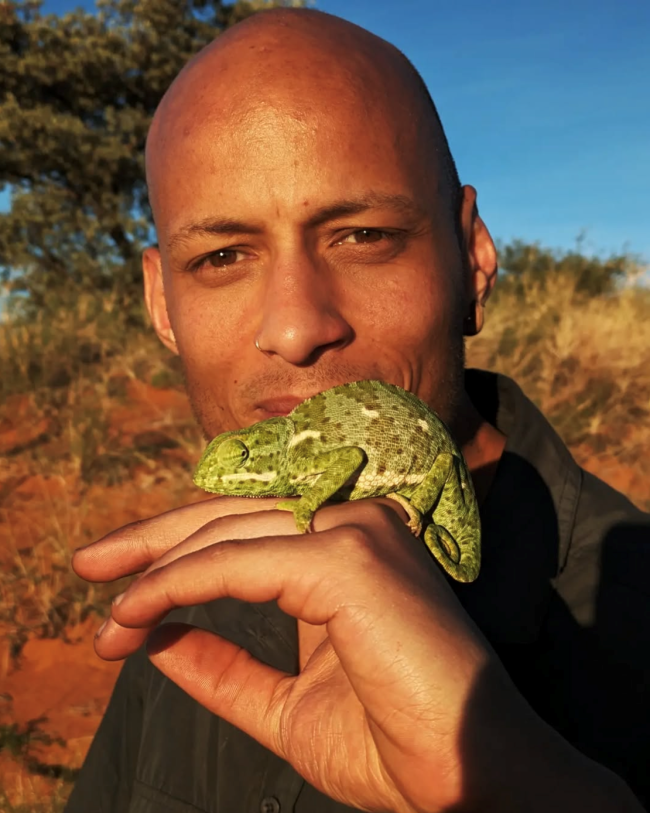 Nathan holding a chameleon