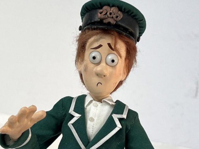 model of a worried looking zoo keeper