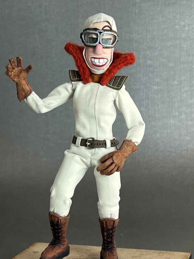 model of an aviator in a white jumpsuit