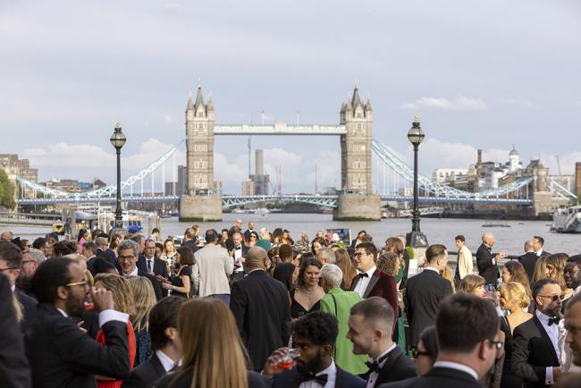 crowd with tower bridge in background