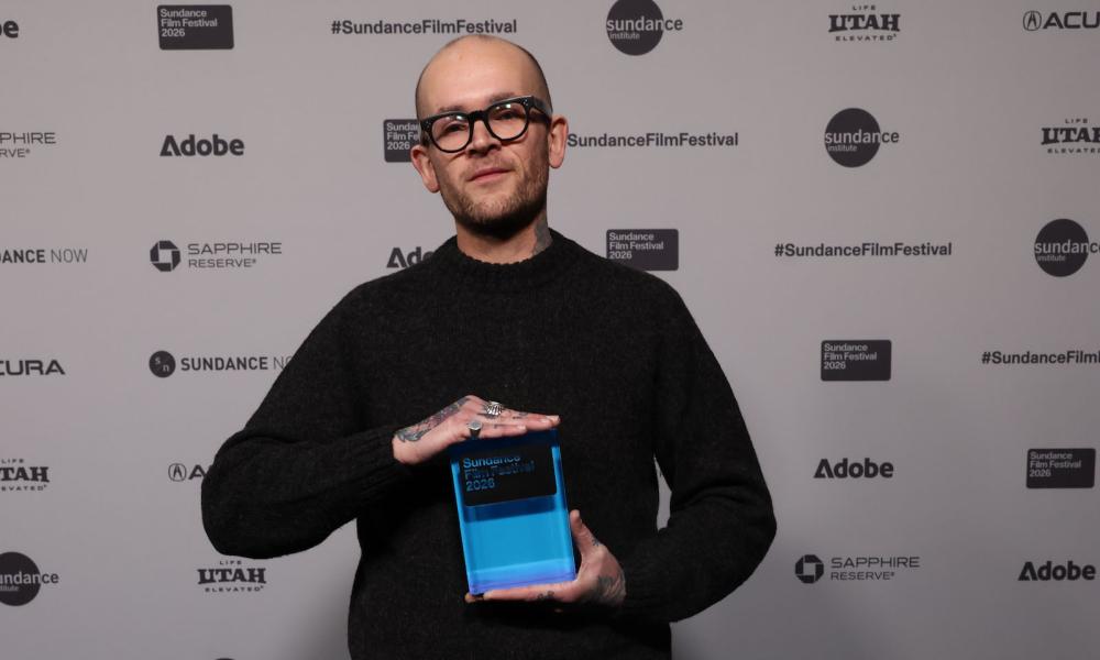 Louis Paxton with award from Sundance Film Festival