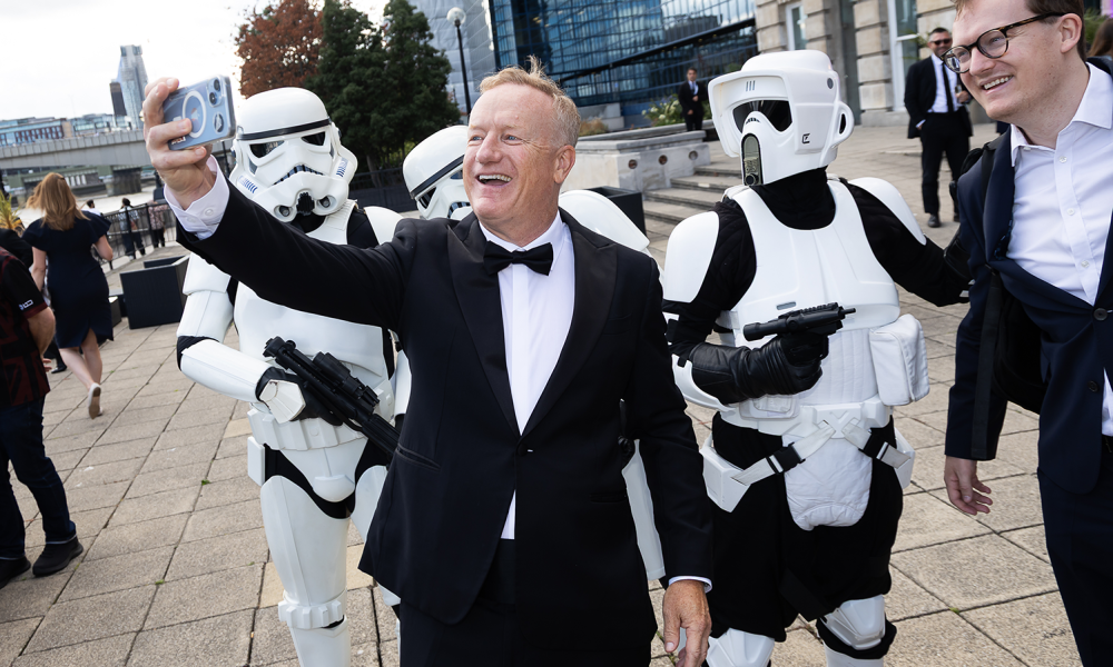 Scott Forrest posing for photo with Storm Troopers