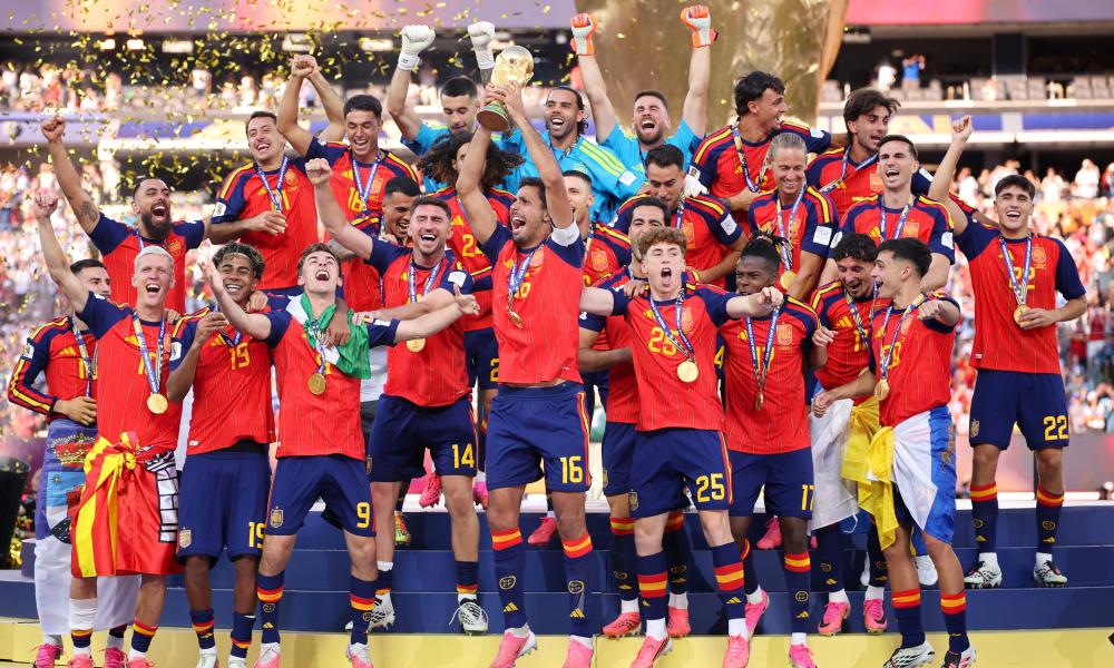 Spain holding World Cup trophy