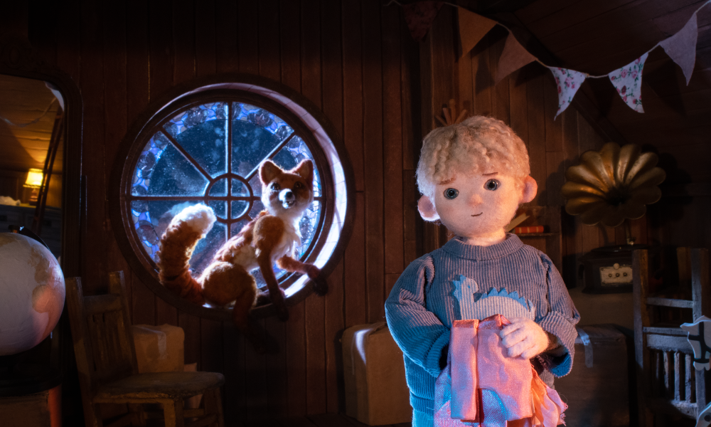 still from dragfox showing fox and child puppet
