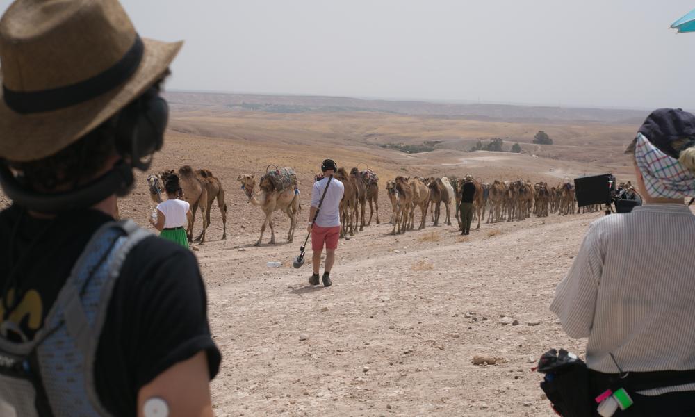 Film crew in desert